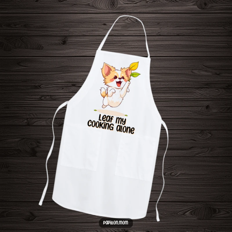 Funny Papillon dog jumping with gusto to grab a falling leaf, printed on a durable and humorous kitchen apron.