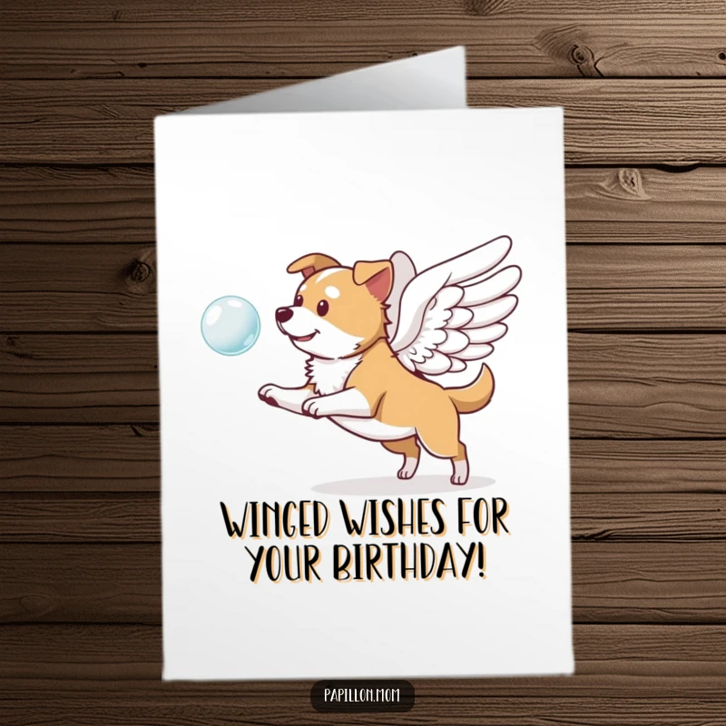 Funny Free Printable Birthday Card featuring a dog with prominent wings playfully chasing a floating bubble