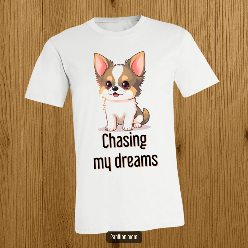 Funny Kawaii Papillon Dog T-Shirt with delicate ears perked, chasing a light beam with focused, playful energy.